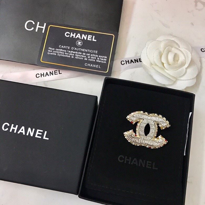 Ch**el brooches